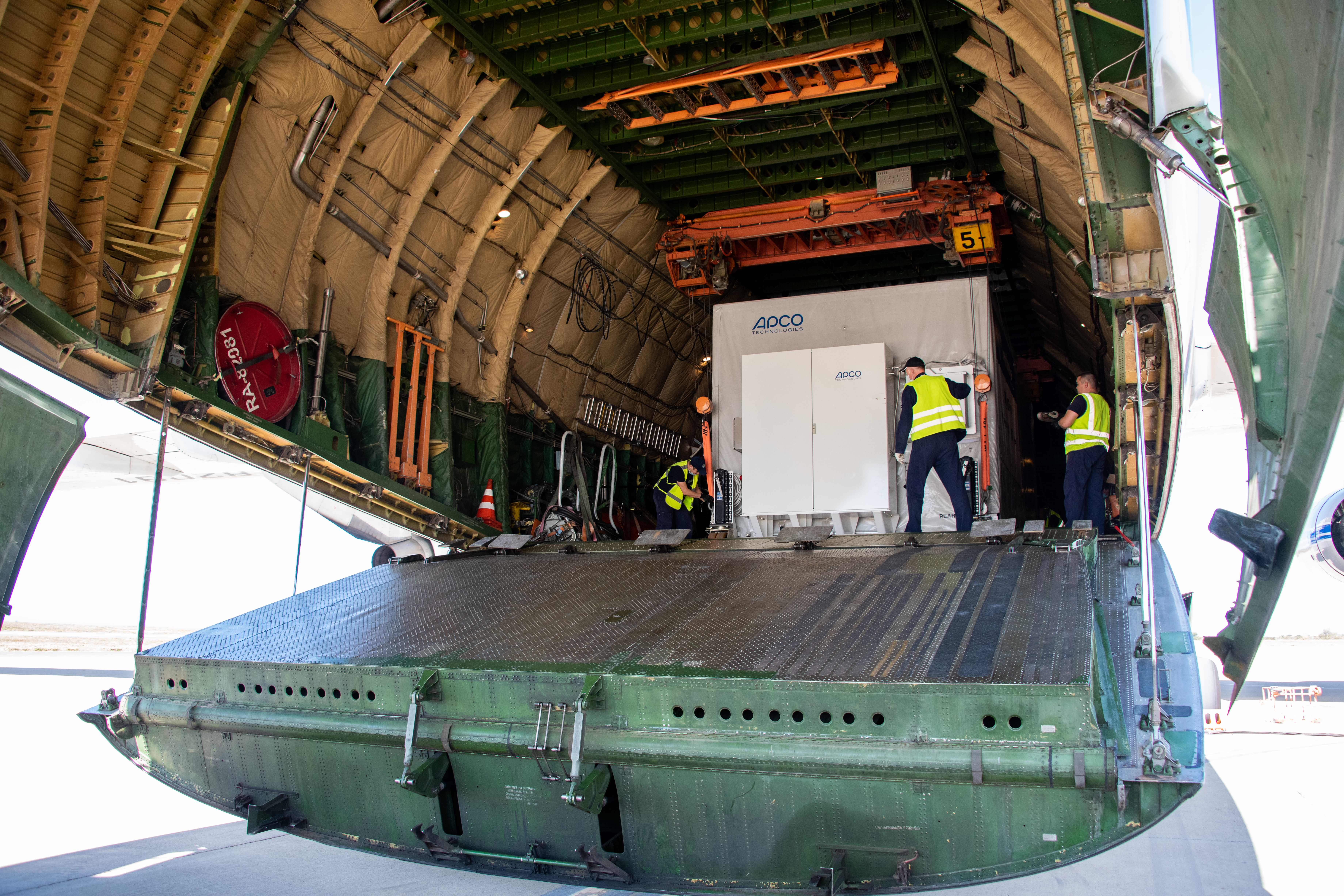 A photo of the plane's cargo bay as crew prepare to unload the spacecraft.