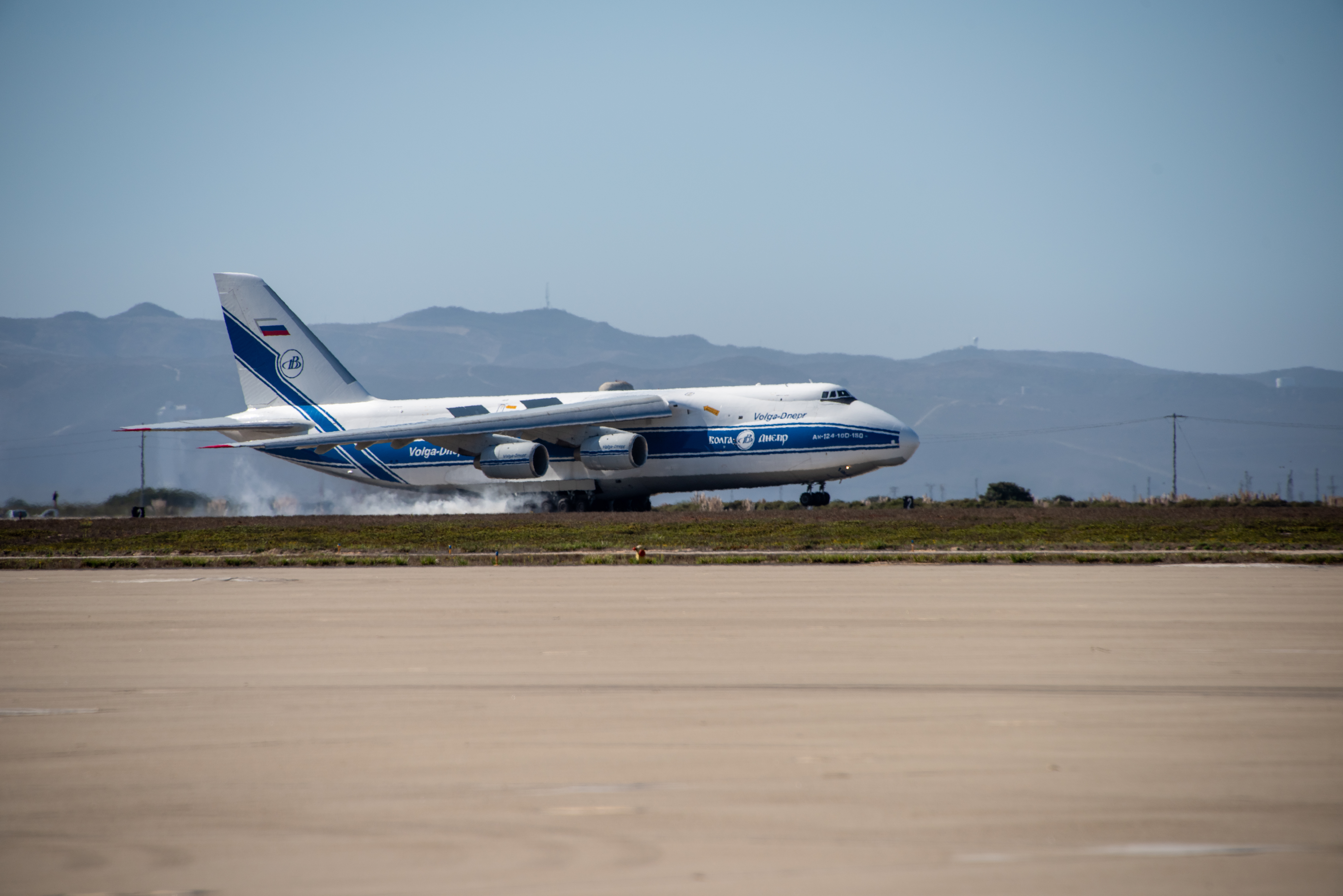 A photo of a plane landing, which has Sentinel-6 Michael Freilich aboard