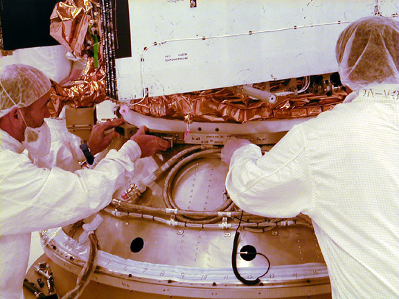 These photos were taken during the Dual Payload Attach Fitting (DPAF) mating operation with Jason-1. (11/13/01) Photos: Scott Michel